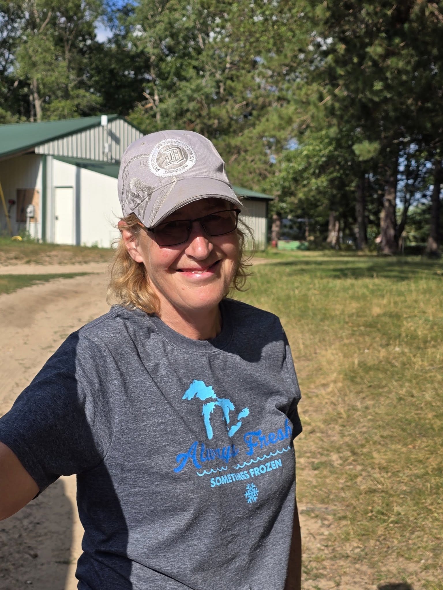 A volunteer helping care for a Journey Equus horse.